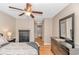 Spacious main bedroom with dark furnishings, wood flooring, and an ensuite bathroom at 3795 Hitchcock Way # 617, Myrtle Beach, SC 29577