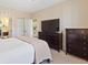 Cozy bedroom with view into bathroom and kitchen at 3943 Gladiola Ct. # 202, Myrtle Beach, SC 29588