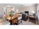 Living room with an attached dining area and open view to the kitchen space at 3943 Gladiola Ct. # 202, Myrtle Beach, SC 29588
