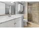 Modern bathroom with stone-look tile, glass shower door and vanity at 410 Melrose Pl. # 110, Myrtle Beach, SC 29572
