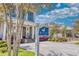 Fitness center entrance with attractive signage, landscaping and modern building design at 410 Melrose Pl. # 110, Myrtle Beach, SC 29572