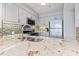 Kitchen featuring granite counters, stainless steel appliances, and neutral toned cabinets at 410 Melrose Pl. # 110, Myrtle Beach, SC 29572