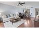 Open concept living room with view to dining area and kitchen at 410 Melrose Pl. # 110, Myrtle Beach, SC 29572