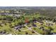 Aerial view of a home in a wooded neighborhood showing lush lawns and mature trees at 4100 Hagwood Circle, Conway, SC 29526