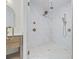 Modern bathroom featuring marble tile, glass enclosed shower with dual shower heads and pebble tile flooring at 4100 Hagwood Circle, Conway, SC 29526
