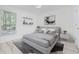 Comfortable bedroom featuring neutral tones, light wood floors, and soft natural lighting at 4100 Hagwood Circle, Conway, SC 29526