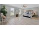 Serene bedroom features hardwood floors, abundant natural light, and a calming color scheme at 4100 Hagwood Circle, Conway, SC 29526