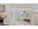 Bright breakfast nook with an abundance of natural light, cozy bench, and white cabinets at 4100 Hagwood Circle, Conway, SC 29526