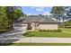 Beautiful brick home showcasing its well-maintained lawn, driveway, and charming curb appeal at 4100 Hagwood Circle, Conway, SC 29526