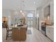 Spacious kitchen with large island, stainless steel appliances, white cabinets, and large window at 4100 Hagwood Circle, Conway, SC 29526