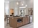 Kitchen island with stainless steel appliances, wood cabinets, and granite countertops in a spacious layout at 4100 Hagwood Circle, Conway, SC 29526