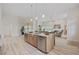 Open concept kitchen with large island, stainless steel appliances, and seamless access to the living area at 4100 Hagwood Circle, Conway, SC 29526