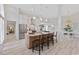Open kitchen features an island with seating, stainless steel appliances, and modern finishes for cooking and gathering at 4100 Hagwood Circle, Conway, SC 29526