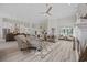 Expansive living room with neutral tones, stylish furnishings, a ceiling fan, and a seamless open-concept layout at 4100 Hagwood Circle, Conway, SC 29526