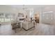 Bright living room features a fireplace, high ceilings, and modern decor creating a welcoming ambiance at 4100 Hagwood Circle, Conway, SC 29526