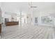 Spacious open-concept living area with hardwood floors and abundant natural light at 4100 Hagwood Circle, Conway, SC 29526