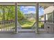 Charming covered front porch providing a picturesque view of the well-manicured lawn at 4100 Hagwood Circle, Conway, SC 29526