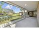 Spacious covered porch showcasing the home's exterior and expansive front yard at 4100 Hagwood Circle, Conway, SC 29526