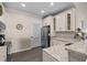 Well-equipped kitchen features granite countertops, modern appliances, and ample storage space at 411 Mahogany Dr. # 202, Murrells Inlet, SC 29576