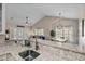 Spacious kitchen featuring open floor plan, granite countertops, and modern amenities at 411 Mahogany Dr. # 202, Murrells Inlet, SC 29576