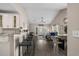 Open concept living room with a vaulted ceiling, modern furnishings, and lots of natural light at 411 Mahogany Dr. # 202, Murrells Inlet, SC 29576