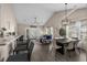 Spacious open living area features vaulted ceiling, natural light, and stylish decor creating a welcoming atmosphere at 411 Mahogany Dr. # 202, Murrells Inlet, SC 29576