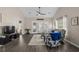 Bright living room featuring high ceilings, natural light, and a comfortable seating arrangement at 411 Mahogany Dr. # 202, Murrells Inlet, SC 29576