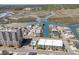 Picturesque aerial view features a waterfront community with canals, beach, and marshland at 4201 N Ocean Blvd. # 2H, North Myrtle Beach, SC 29582