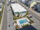 Overhead shot of condos with a pool and parking situated close to a beach at 4201 N Ocean Blvd. # 2H, North Myrtle Beach, SC 29582