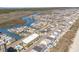 Expansive aerial view showing coastal homes nestled along a serene river and the beautiful shoreline at 4201 N Ocean Blvd. # 2H, North Myrtle Beach, SC 29582