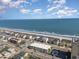 Scenic aerial shot of beachfront properties with easy beach access and stunning ocean views at 4201 N Ocean Blvd. # 2H, North Myrtle Beach, SC 29582