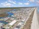 Gorgeous aerial view displays waterfront community nestled between the river, marsh, and ocean at 4201 N Ocean Blvd. # 2H, North Myrtle Beach, SC 29582