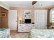Inviting bedroom featuring white furnishings, ample closet space, and a cozy, relaxed atmosphere at 4201 N Ocean Blvd. # 2H, North Myrtle Beach, SC 29582