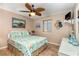 Comfortable bedroom featuring a decorative ceiling fan and coastal-themed decor for a relaxing ambiance at 4201 N Ocean Blvd. # 2H, North Myrtle Beach, SC 29582