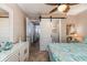 Well-decorated bedroom with ensuite bathroom featuring a barn door at 4201 N Ocean Blvd. # 2H, North Myrtle Beach, SC 29582