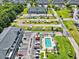 Aerial view showcasing boat storage, a pool, and condo buildings, offering residents convenient amenities and waterfront living at 4518 N Planatation Harbour Dr. # G-17, Little River, SC 29566