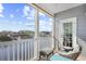 Relax on the private balcony with seating and serene water views at 4518 N Planatation Harbour Dr. # G-17, Little River, SC 29566