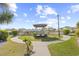 Charming gazebo with manicured landscaping, providing a peaceful retreat in a serene community setting at 4518 N Planatation Harbour Dr. # G-17, Little River, SC 29566