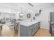 Open floor plan features spacious kitchen with stainless steel appliances open to living area at 4518 N Planatation Harbour Dr. # G-17, Little River, SC 29566