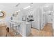 Open concept with bright kitchen with stainless steel appliances and peninsula seating at 4518 N Planatation Harbour Dr. # G-17, Little River, SC 29566