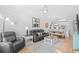 Spacious open-concept living room with plenty of seating and natural light is warm and inviting at 4518 N Planatation Harbour Dr. # G-17, Little River, SC 29566