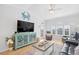 Cozy living room features a TV and beach-themed decor that is perfect for coastal living at 4518 N Planatation Harbour Dr. # G-17, Little River, SC 29566