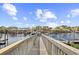 Scenic waterfront view with multiple docks and boat slips, providing convenient access for boating and water activities at 4518 N Planatation Harbour Dr. # G-17, Little River, SC 29566