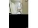 Bright bathroom with tiled floors, white vanity, and a shower/tub combo at 4669 Wild Iris Dr. # 22-2O2, Myrtle Beach, SC 29577