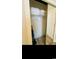 Open closet with shelves and hanging space, containing bedding and a vacuum cleaner at 4669 Wild Iris Dr. # 22-2O2, Myrtle Beach, SC 29577