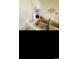 Close-up of a kitchen sink featuring a double basin and countertop appliances on white countertops at 4669 Wild Iris Dr. # 22-2O2, Myrtle Beach, SC 29577
