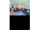 Spacious living room offering plenty of seating and a smooth flowing open floorplan at 4669 Wild Iris Dr. # 22-2O2, Myrtle Beach, SC 29577