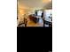 Living room and dining area with a blend of comfort and charm in an open layout at 4669 Wild Iris Dr. # 22-2O2, Myrtle Beach, SC 29577