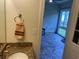Bright bathroom with access to a screened porch or sunroom at 505 Heartland Ct., Murrells Inlet, SC 29576