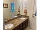 Dual sink bathroom with granite countertops and decorative tile at 505 Heartland Ct., Murrells Inlet, SC 29576